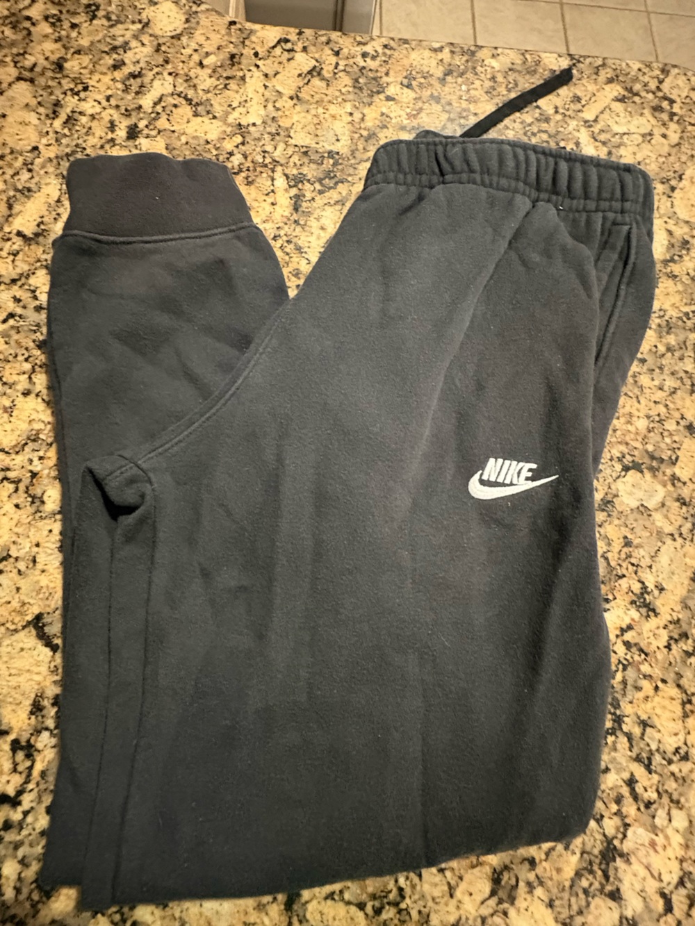 Nike women’s Black Joggers with White Swoosh Logo medium